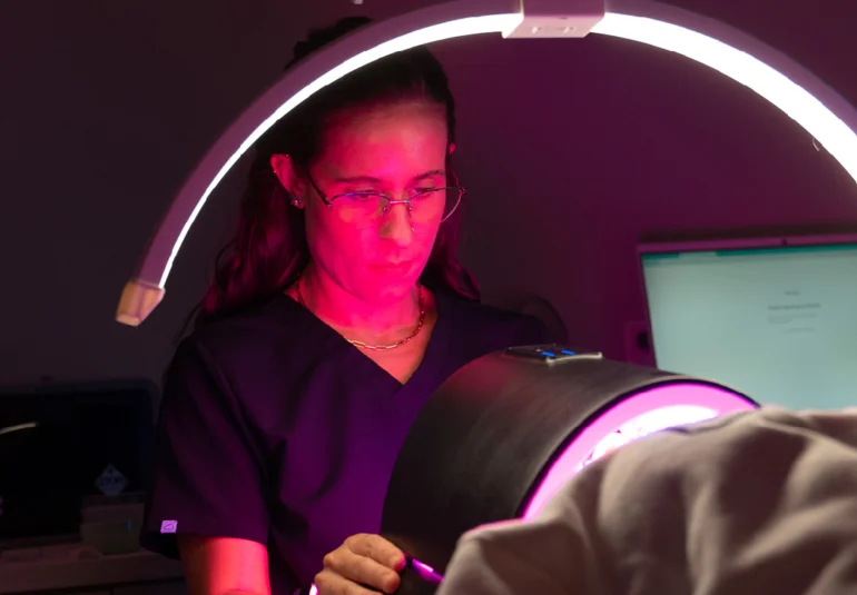 relive health hendersonville medspa employee administering LED light therapy to patient 2 1600x733 1