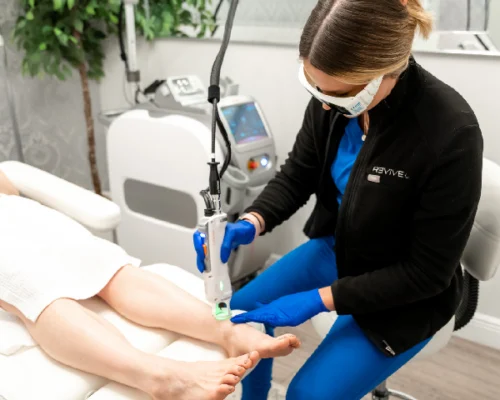 relive health hendersonville medspa female employee administering Laser Hair Removal treatment to female patient (2) 600x600
